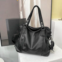 Greta | Borsa tote strutturata con dettagli metallici