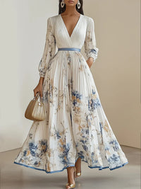 Sofia | Flowing dress with floral print and flattering silhouette  