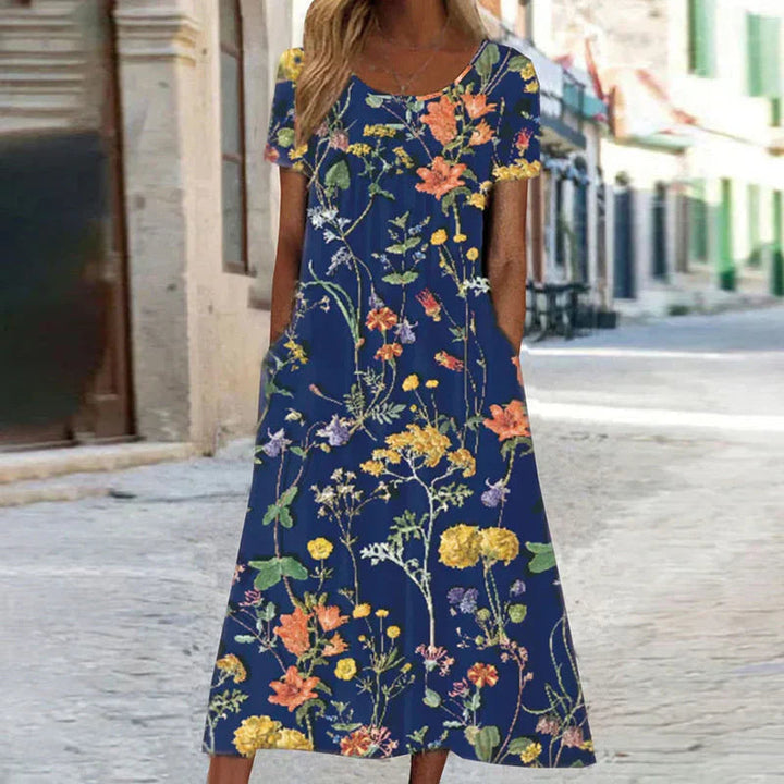 Isabella | Elegante Abito Midi Donna con Stampa Botanica e Maniche Corte 1