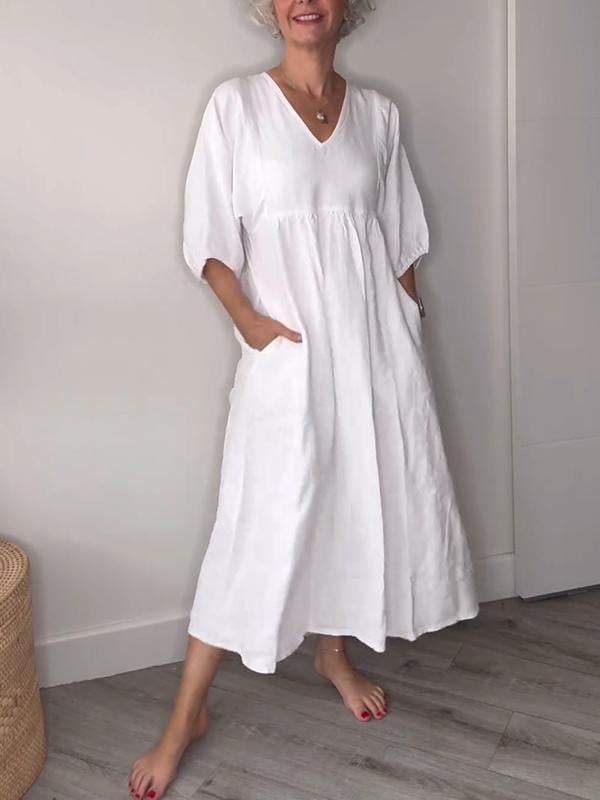 Klara | Abito midi con scollo a V e design elegante 0