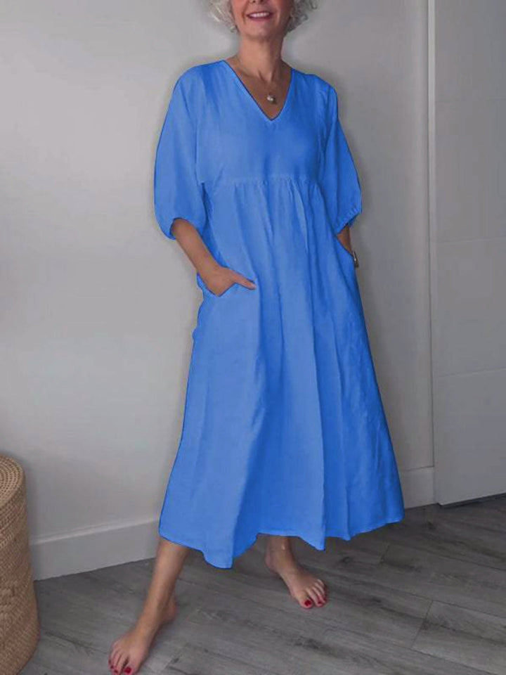 Klara | Abito midi con scollo a V e design elegante 4