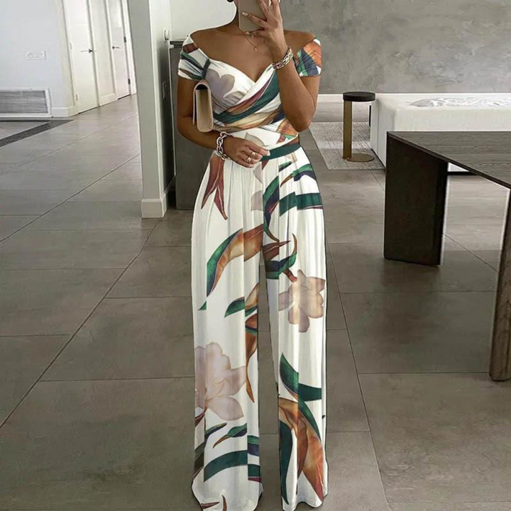 Milo | Elegante Tuta Donna Floreale con Silhouette Palazzo e Spalle Scoperte 1