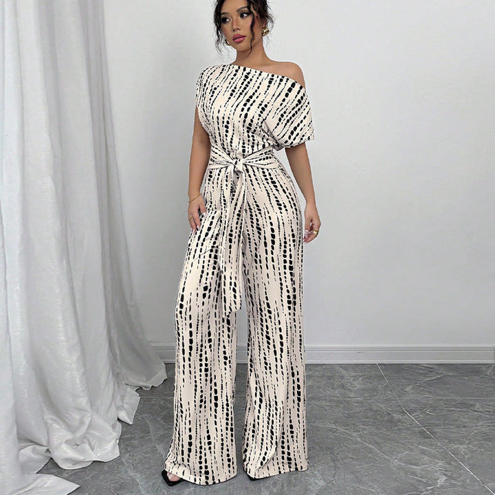 Mirella | Elegante Tuta Donna Monospalla con Stampa Astratta e Gamba Ampia 0
