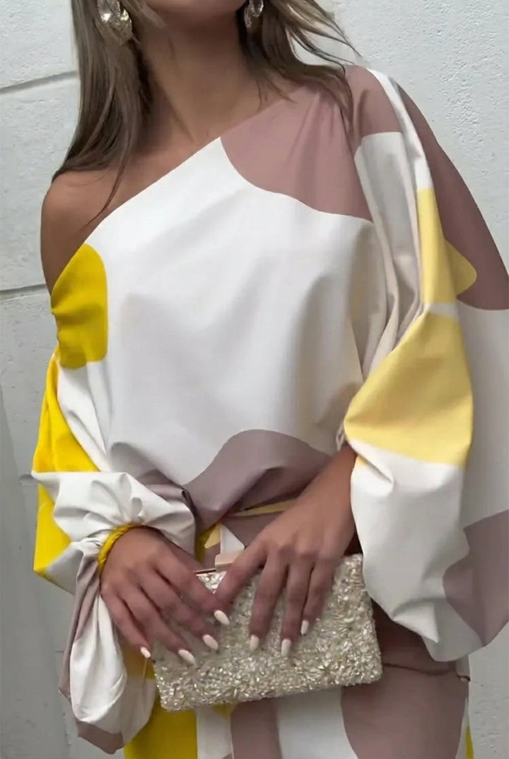 Valentina | Elegante Set Midi Asimmetrico con Scollo Monospalla e Dettagli di Frange 3